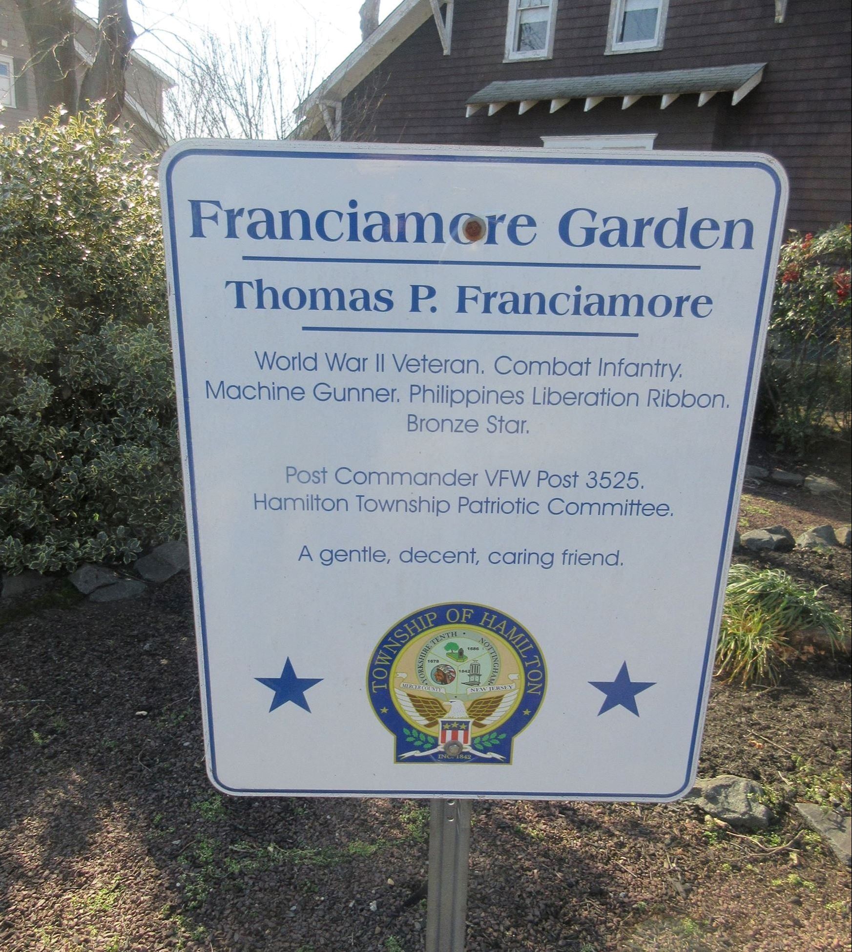 Informational sign about the dedication of Franciamore Garden.
