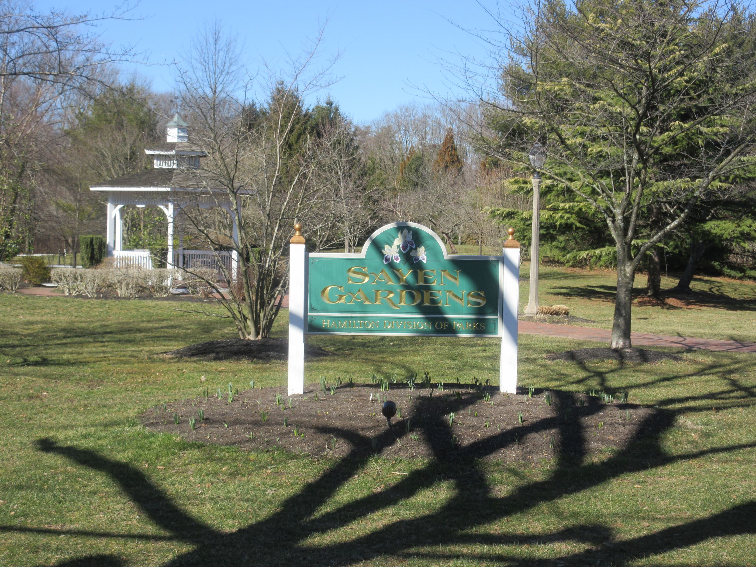 View from Mercer Street of the Sayen Garden welcome sign.