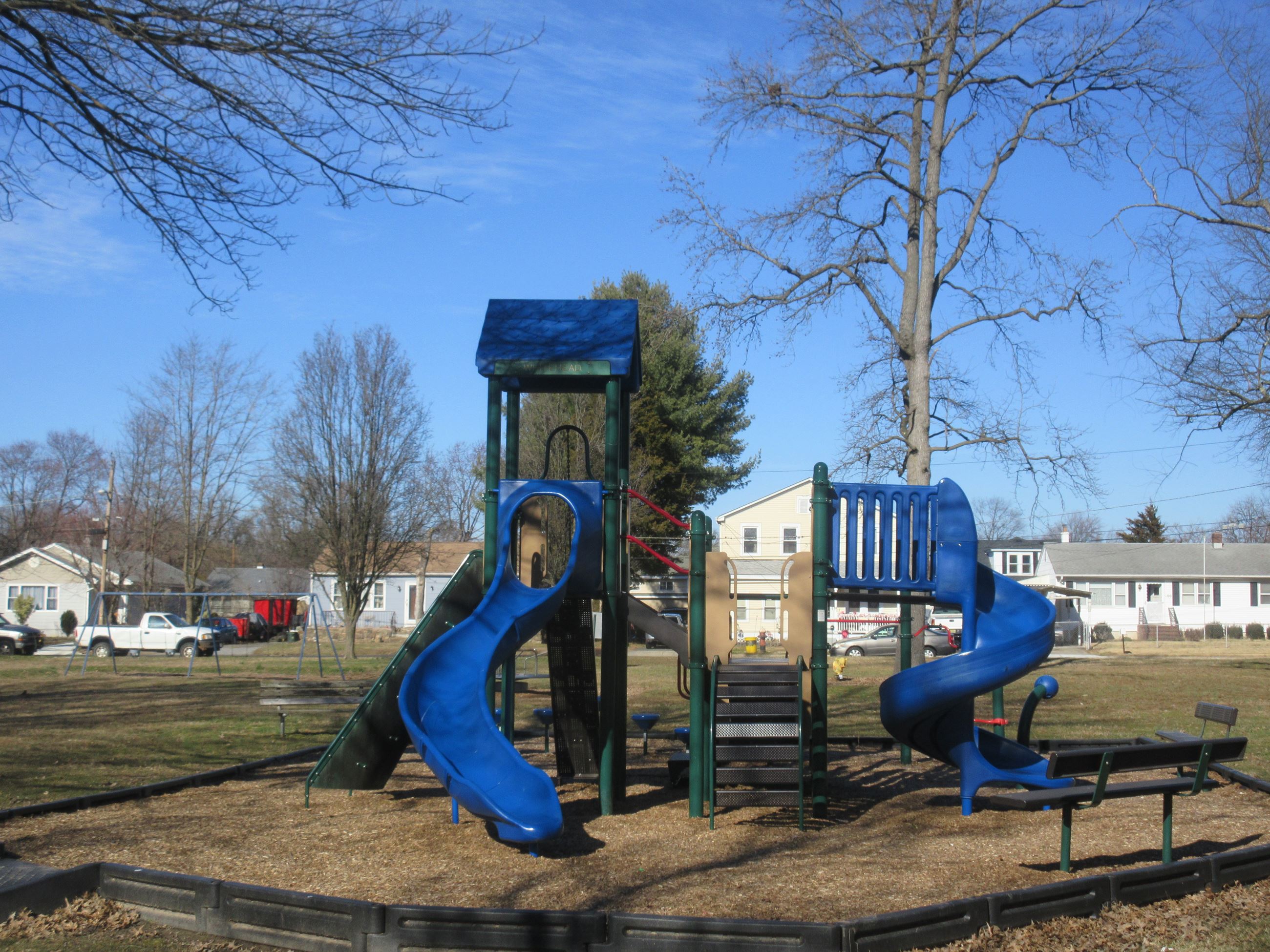 Ground level view from Fourth Avenue of the children's activity center - Whitehead Park.