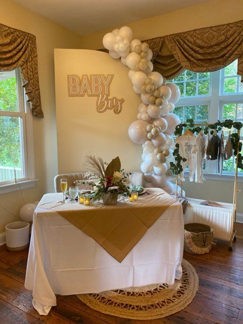 Baby shower with balloon arch