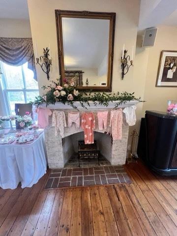 Fireplace with baby outfits hanging
