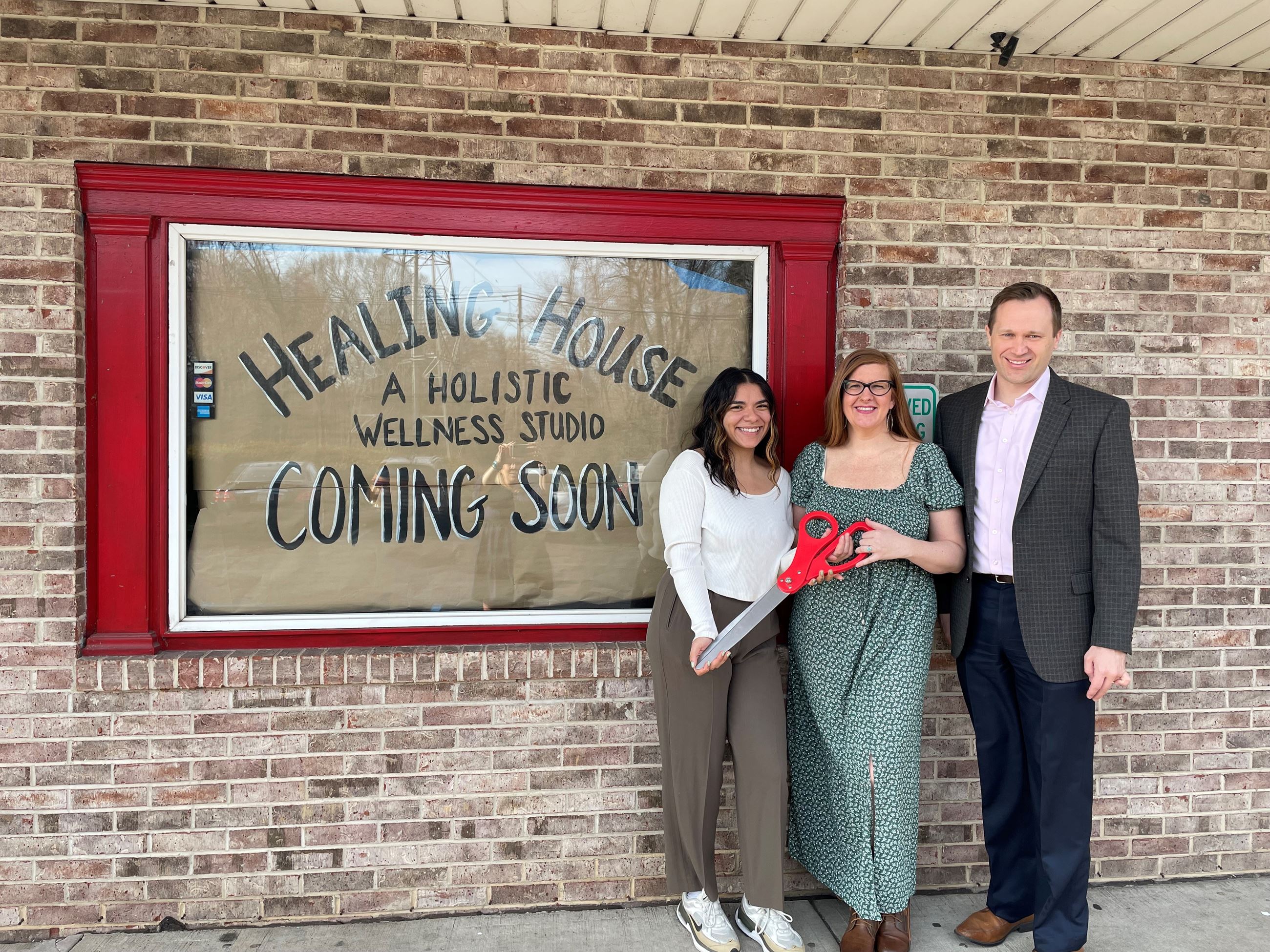 Healing House owners and Mayor Martin in front of the facility